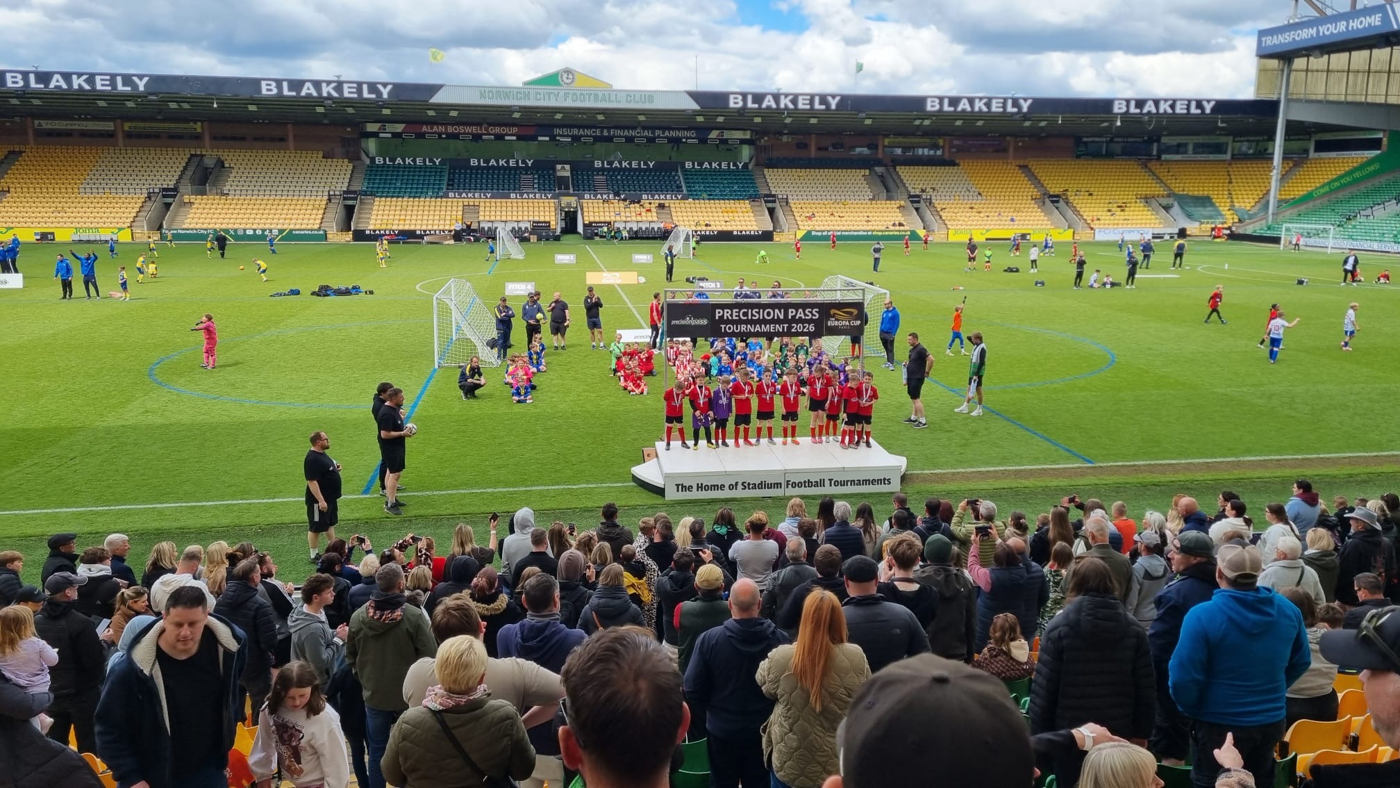 Youth football tournament ceremony at a Premier League stadium