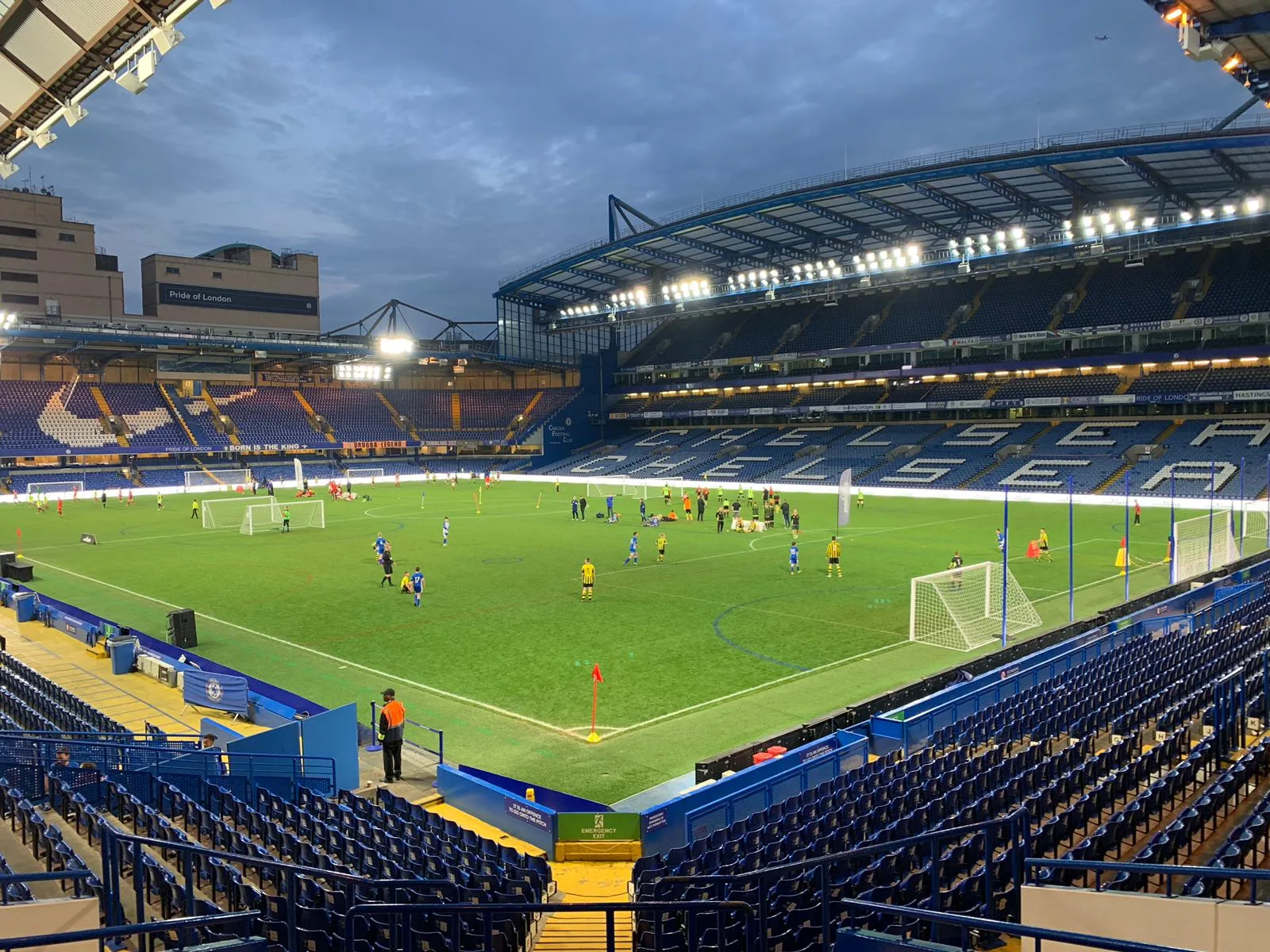 Youth football tournament at a Premier League stadium — play on the pitch